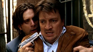Castle finds a gun pointed at his face in the first episode's climax.