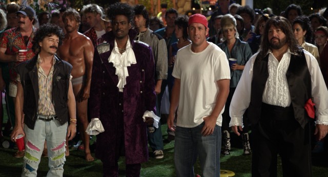 Dressed as '80s musicians John Oates (David Spade), Prince (Chris Rock), Bruce Springsteen (Adam Sandler) and Meat Loaf (Kevin James), the Grown Ups prepare to rumble with snobby lacrosse stick-wielding frat boys.
