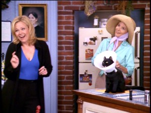 With two goofy aunts (left to right, Caroline Rhea and Beth Broderick) and a talking cat (Salem in neck cast), life is rarely dull in the Spellman house.