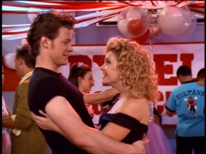 One gets the feeling that Harvey and Sabrina will always... be together... Here, they dress like Danny Zuko and Sandy at the school's Grease-flavored dance.