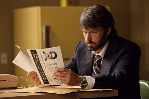Tony Mendez (Ben Affleck) looks through some important documents while plotting to secure the release of American diplomats being held hostage in Iran.