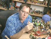 Director John Lasseter amidst a toy-filled environment in "Behind the Scenes of A Bug's Life."