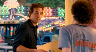 Ride maintenance guy Mike Connell (Ryan Reynolds) dispatches wisdom to receptive younger Adventureland workers like James.