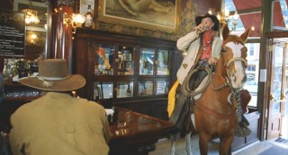 The first person profiled: Roudy Roudebush, a gruff cowboy and former alcoholic. Now he rides into the bar on horse to take his favorite drink: water.
