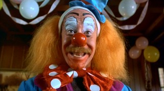 As Norman Snively, Michael Jeter gets top billing but spends his limited screentime covered either in clown makeup or mud.
