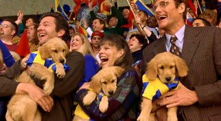 The Buddies look thrilled to be cheering on their father in the arms of Patrick (Dale Midkiff), Jackie  (Chilton Crane), and Geoffrey Putter (Duncan Regehr).