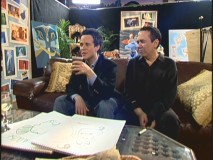 Scott Weinger and Gilbert Gottfried hang out backstage in the Green Room.