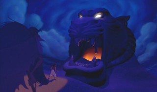 Aladdin approaches the Cave of Wonders with caution.
