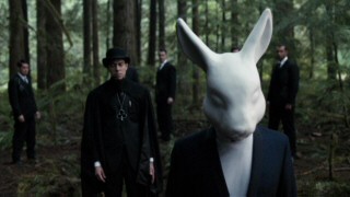 Mad March (Geoff Redknap) has a robotic head more reminiscent of the White Rabbit than the March Hare as he scours the countryside for Alice.