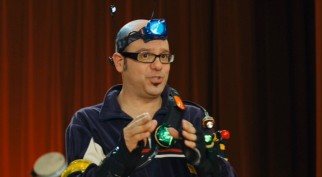 Record exec Ian Hawke (David Cross) suits up in hi-tech gadgetry so he can make a big impression in the world's music mecca: a high school gymnasium.