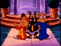 Alvin and Simon sing and dance with an alien of eerily similar proportions to Theodore.