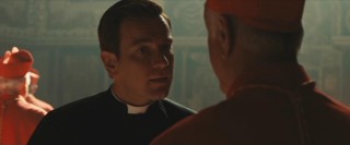 Camerlengo Patrick McKenna (Ewan McGregor) urges Cardinal Strauss to let the public know they're in danger, but Strauss prefers to keep the Illuminati plot under wraps.