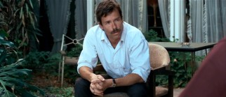 Guy Pearce plays mustachioed police detective Nathan Leckie, seen here interrogating J, to whom he'll extend a witness protection program offer.