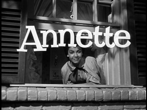 Annette Funicello, playing Annette McCleod, smiles from her character's bedroom window as the serial's title -- what else, but "Annette" -- is displayed.
