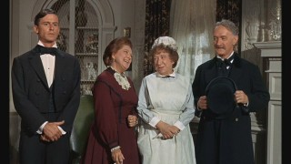 Butler Eric Griffin (Roddy McDowall) is unmoved by the bulky sum he's just learned his former master has left him in his will.