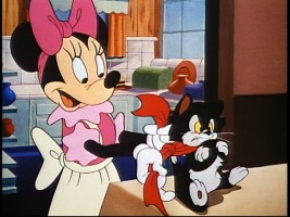 Figaro looks none too pleased to receive the red bow treatment from Minnie Mouse in the bonus cartoon short "Bath Day."
