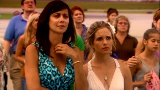 Denise (Catherine Bell) and Roxy (Sally Pressman) watch as their husbands fly to the Middle East for an undetermined period of time.