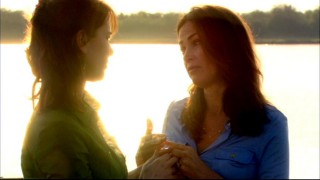 Claudia Joy (Kim Delaney) tries to explain how she must support her husband even above other friends.