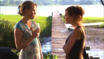 Pamela (Brigid Brannagh) demands an explanation from a nonchalant Jessica (Misti Traya) over the underhanded work of their partnered husbands.