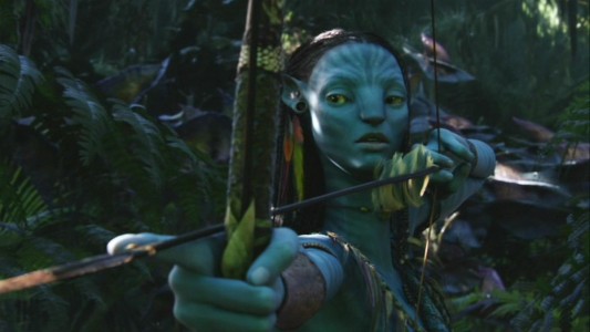 Female Na'vi Neytiri (Zoe Saldana) first comes upon Jake in the forest, bow ready.