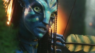 Separated from her fellow Na'vi during the battle, Neytiri (Zoe Saldana) readies her bow just before a major interruption comes her way.