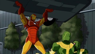 Iron Man, presently the most famous Avenger, lifts a car while defending the United Nations against HYDRA agents.