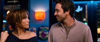 On their third meeting, Stan (Alex O'Loughlin) shows up at Zoe's (Jennifer Lopez) pet shop for a Cesar Millan talk/signing.
