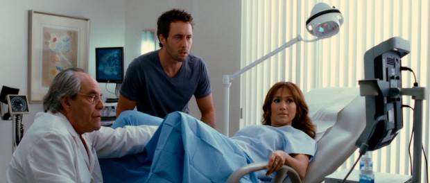 Dr. Harris (Robert Klein) surprises Zoe (Jennifer Lopez) and Stan (Alex O'Loughlin) with an ultrasound discovery: she's having twins!