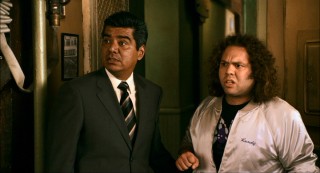 Agent Rodriguez (George Lopez) and Randy are slightly flabbergasted by what they see in Master Wong's Happy Mu Shu Palace.