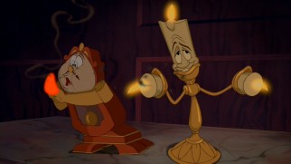 Cogsworth and Lumiere play charades ("Burning the midnight oil").