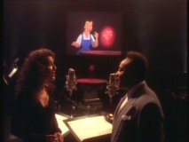 Celine Dion and Peabo Bryson appear in soft-focus, big-haired glory to perform their pop rendition of "Beauty and the Beast."