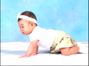 This little girl demonstrates "crawling."