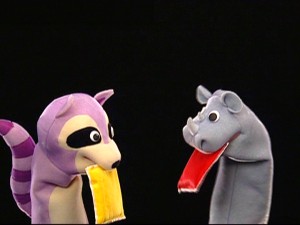 Raccoon and Rhino get down to a fierce game of beanbags.