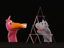 Large Bird tries to help Rhino with his house of cards in a bonus Puppet Show.