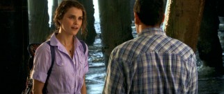 As the requisite love interest, schoolteacher Jill Higgins (Keri Russell) takes some time to prove appealing to Skeeter.