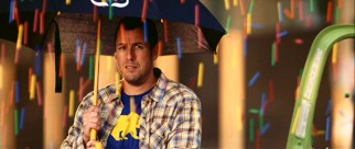 Skeeter (Adam Sandler) wields an umbrella for the unusual raining of gumballs foretold the night before.