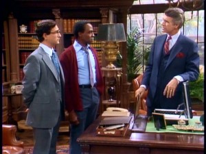 In the office that's never lacking excitement, chief of staff Taylor (Lewis J. Stadlen) and Benson listen to the Governor (James Noble) sharing his thoughts.