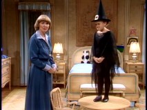 Miss Kraus gives a few pointers to Katie, who's dressed like a witch for an upcoming school play.