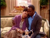 Benson embraces his ex-girlfriend (Denise Nicholas), while raising suspicions of an affair.