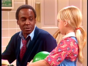 A supplementary father figure, Benson imparts wisdom to Katie on a fairly regular basis.