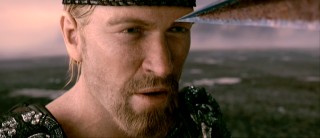 In his first appearance, Beowulf makes such a tough look that the sword aimed near his eye should fear the prospect of getting lanced by his forehead.