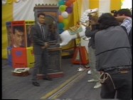 Tom Hanks poses by Zoltar in the Carnival Party Newswrap at Fox's nifty "Big" premiere.