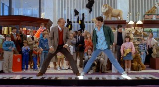 MacMillan and Josh make full use of walking piano to play "Chopsticks" and "Heart and Soul" to the delight of FAO Schwarz shoppers.
