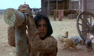 Handcuffed to a stake, Billy (Desi Arnaz Jr.) patiently awaits his freedom.