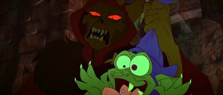 Goofy assistant Creeper barely weathers the fright that the glowing-eyed skeletal villain The Horned King provides.