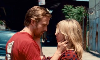 Dean (Ryan Gosling) and Cindy (Michelle Williams) share a sidewalk kiss in their younger, happier days.