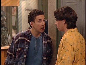 Cory Matthews (Ben Savage) and Shawn Hunter (Rider Strong) consult in the hallway.