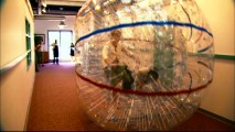 Rolling down the hall in a big plastic ball like Rhino's, "Bolt" crew members party like it's Pixar circa 1999 in the featurette "A New Breed of Directors."