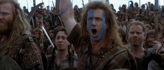 William Wallace: Scottish warrior or UNC Tar Heels fan? You decide. Donning his famous blue face paint, Wallace commands his troops to hold as the English soldiers surge against them.