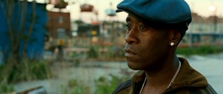 Tango (Don Cheadle) is conflicted about sending his friend Caz back to jail to get out of dangerous undercover work and into a comfy desk promotion.